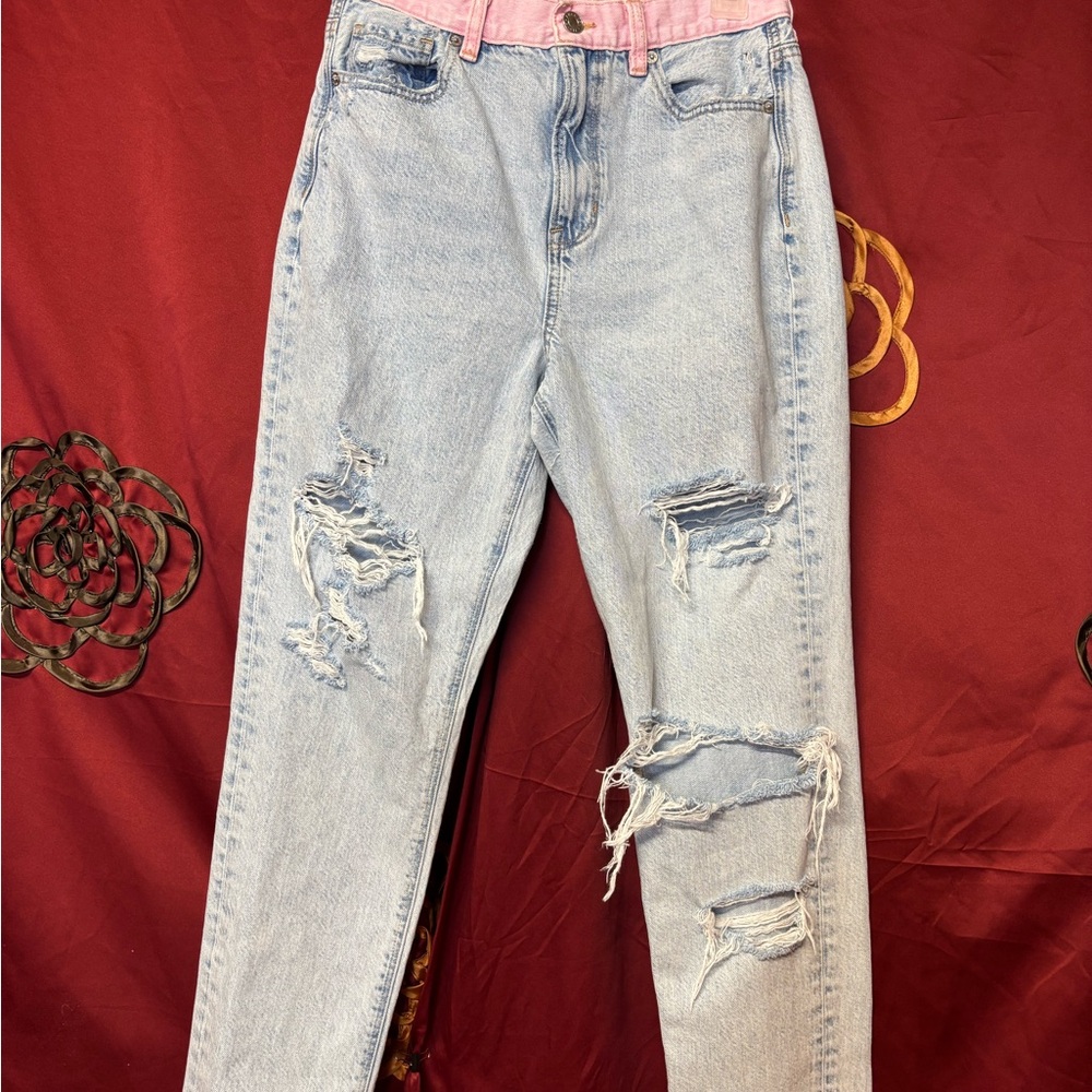 Distressed Light Blue Jeans with Pink Waistband